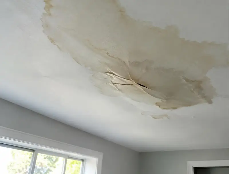 Water-stained ceiling after a leak